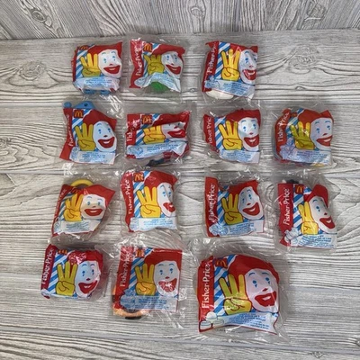 McDonald’s Fisher-Price Happy Meal Juguetes Menores de 3 años, 1996-1998, Lote de 14 NUEVOS PRECINTADOS Foto 1 de 4
