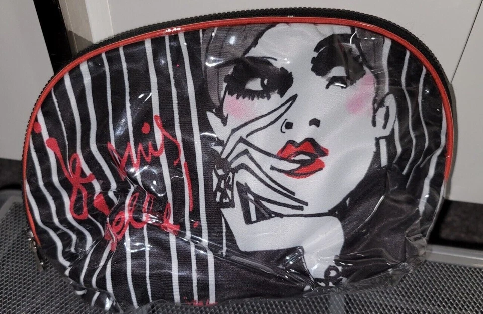 IZAK NEW YORK FRENCH FASHION GIRL PLASTIC ZIPPERED COSMETIC MAKEUP BAG - Image 1 of 4