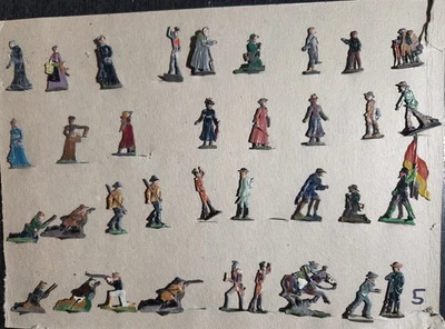 JUEGO DE 35 FIGURAS DE ESTAÑO PLANAS DE HOJALATA VINTAGE PIONEROS Y ALDEANOS AMERICANOS Foto 1 de 4