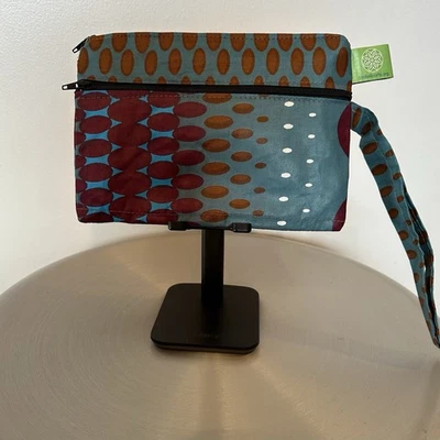 Bolsa clutch ou pulseira azul-petróleo marrom e laranja bolinhas com fecho de zíper - Imagem 1 de 4