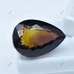 La mejor piedra preciosa natural de 35,80 quilates corte pera biocolor ametrino CERTIFICADA del mundo - Imagen 1 de 12