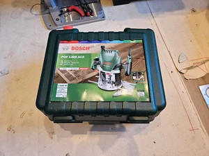 Bosch router POF 1400 ACE + Bosch Professional 6-Piece Groove Cutter Set - Picture 1 of 4
