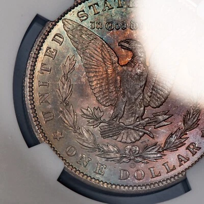 1904-O $1 Morgan Dollar - PQ Rainbow Mint Bag Toning - NGC MS 64 - VIDEO - D5059 - Image 1 of 4