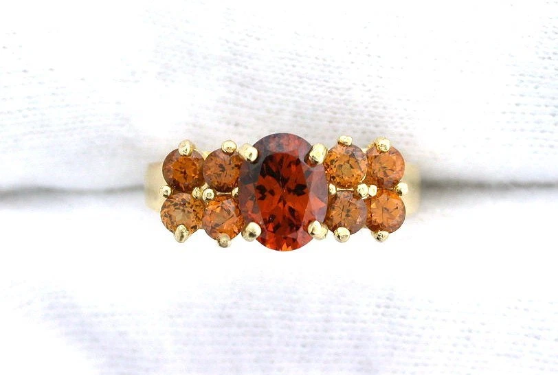 Anillo de oro amarillo de 14 quilates 8x6 ovalado redondo hessonita gema redonda gema damas racimo Foto 1 de 3