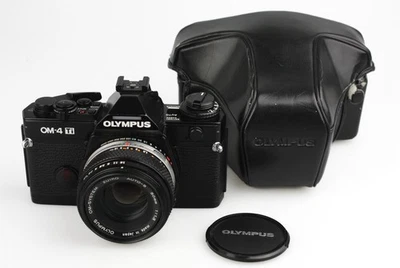 Olympus OM-4 TI (Titan) analoge Spiegelreflexkamera 35 mm mit 50 mm f1,8 Zuiko (schwarz) - ... - Bild 1 von 4