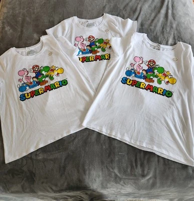 LOTE DE 3 CAMISETAS HÍBRIDAS SUPER MARIO NINTENDO, TODAS TALLA XL Y NUEVAS CON ETIQUETAS. Foto 1 de 4