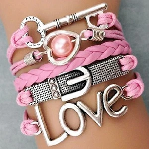 BRACELET Skeleton Key with Pink Braid and Charms - 5 Different Connected Bands - Imagen 1 de 2