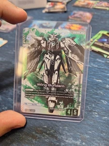 Gundam TCG Beta WING ALT ART ST02-001LR+ in Top Loader, Kept Out Of Sun. - Picture 1 of 2