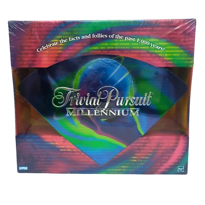 Trivial Pursuit Millennium Edition Board Game Trivia Wedge Shape Tin Sealed 1998 - Image 1 of 4