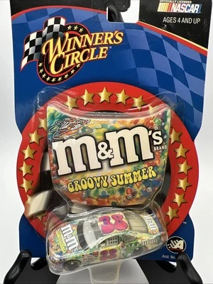 2003 Winner's Circle 1:64 Elliott Sadler #38 M&M's Groovy Summer Ford Taurus NIP - Image 1 of 4