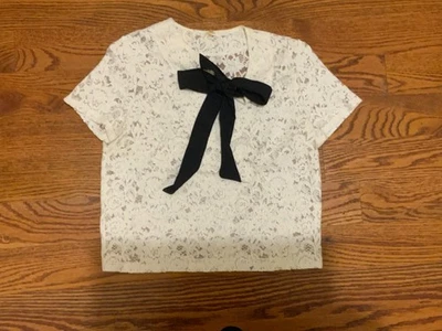 SUPRANO TOP DE ENCAJE BLANCO ROTO CON LAZO NEGRO MUJER ELEGANTE Foto 1 de 2