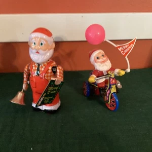 2 Vintage Christmas Toys Tin Wind-up Santas On Tricycle Balloons & Bell Ringer - Picture 1 of 16