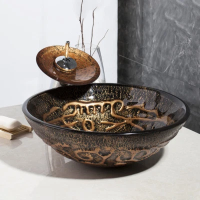 Lavabo redondo de vidrio para baño y grifos de cascada cromados montados en cubierta Foto 1 de 4