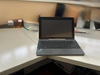 LIBRO/TABLETA ASUS TRANSFORMER T100TA B1 GR 10.1" pantalla táctil CASI COMO NUEVA EN ESTADO - Imagen 1 de 4