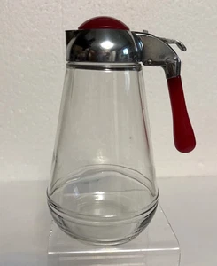 Jarra de jarabe vintage con mango de baquelita roja y tapa de cromo de 6,5" - Imagen 1 de 9