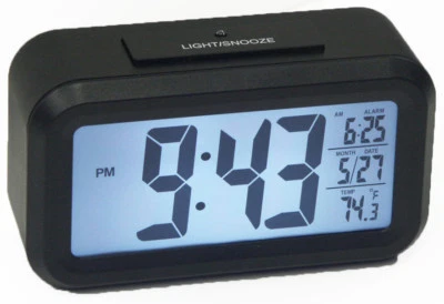 1.5 LCD NUMBER ALARM CLOCK WITH LIGHT SENSOR FOR NIGHT TIME ILLUMINATION - Image 1 of 2