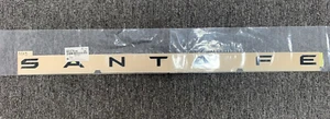 OEM 86310-P6100 Emblem 'S A N T A  F E' Black Ems for Hyundai Santa Fe 2024~2026 - Bild 1 von 8