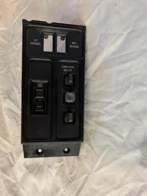 Interruptor de panel de interruptor de descongelación trasero asiento consola central Dodge Daytona 84-89 OEM Foto 1 de 2