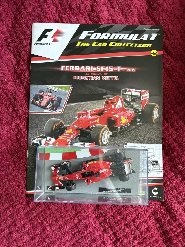 #42 Panini Scale 1:43 Formula 1 Ferrari SF15-T Sebastian Vettel 2015 - Image 1 of 1