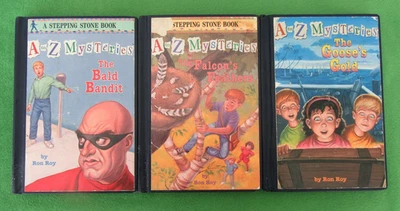 LOT 3 HC A TO Z MYSTERIES BY RON ROY: BALD BANDIT, FALCON'S FEATHERS, G - EX-LIB - Image 1 of 4