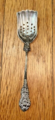 Cuchara de té antigua inusual moneda ranurada .800 plata ornamentada forma festoneada ¡¡Guau!!! Foto 1 de 4