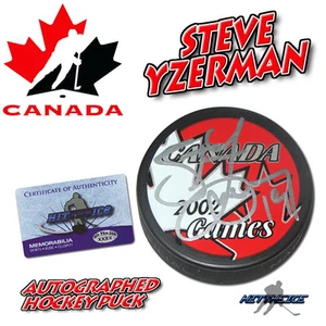 STEVE YZERMAN signierter RED WINGS / TEAM CANADA GOLDMEDAILLE PUCK - mit Echtheitszertifikat - Bild 1 von 1