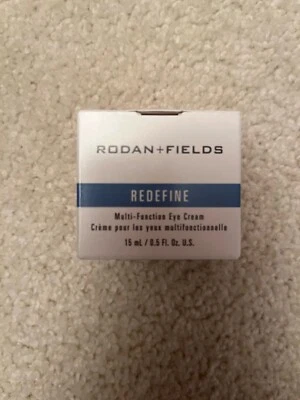 Crema de ojos multifunción Rodan + Fields Redefine - 0,5 fl oz Foto 1 de 4