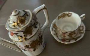 Royal Crown Derby Asian Rose Coffee Pot, 7 5/8", with Lid) and matching cup - Picture 1 of 4