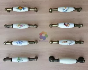 MANIGLIETTA PORCELLANA CASSETTI CUCINA ARMADI 96 MM ANTICATA CERAMICA - Foto 1 di 17