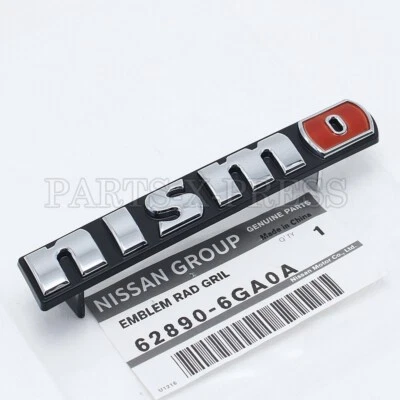 NUEVO ORIGINAL FABRICANTE DE EQUIPOS ORIGINALES NISSAN 370Z LOGOTIPO NISMO PARACHOQUES DELANTERO PLACA DE IDENTIFICACIÓN EMBLEMA 62890-6GA0A Foto 1 de 4