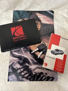 1996 SATURN HANDBOOK, Factory OWNERS Maintenance MANUAL, 1992 Brochure VCR Tape - Picture 1 of 15