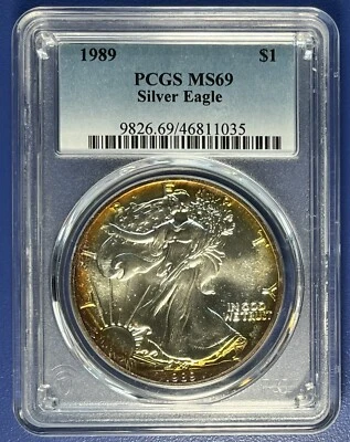 1989 American Silver Eagle ASE 1oz BU Graded PCGS MS69 AWESOME TONING #73923 - Image 1 of 2