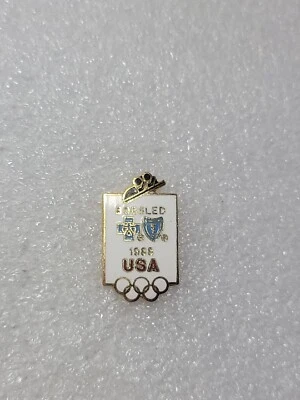 VTG 1988 Calgary USA Bobsled Olympic Blue Cross Blue Shield Enamel Pin Clutch - Image 1 of 4
