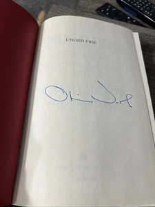 COLONEL OLIVER NORTH SIGNED BOOK “UNDER FIRE AN AMERICAN STORY” HC 1st EDITION - Picture 1 of 4
