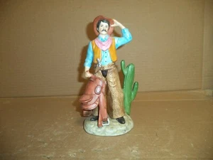 Vintage HOMCO Cowboy Porcelain Figurine #1419 Carrying Saddle - Picture 1 of 5