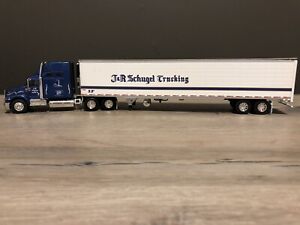 DCP 30031 1:64 Scale J&R Schugel Trucking IH 9400 Semi w/ Reefer Trailer