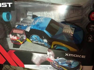 Exost Xmoke 2Ghz ferngesteuertes RC Auto mit LED-Leuchten & echtem Raucheffekt. Blau - Bild 1 von 4