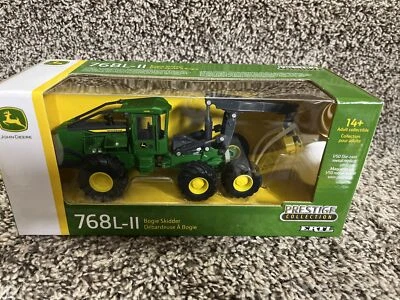 ERTL 2021 1:50 JOHN DEERE 768L-II BOGIE GARRA PATINADOR DE TRONCOS PRESTIGIO ¡NUEVO!! Foto 1 de 2