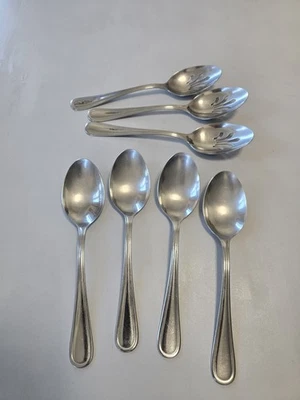 Stainless Set Of 7 Spoons 3 Slotted Spoons And 4 Serving Spoons Made In China  - Image 1 of 4