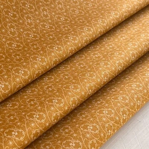 Tela Floral Calicó Amarillo Cobre 100% Algodón 44" Ancho - Se Vende por Yarda - Imagen 1 de 3