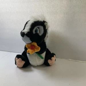 Vintage Disney Store Blume Bambi Stinktier Plüsch mit gelber Blume Stofftier 9 Zoll - Bild 1 von 9