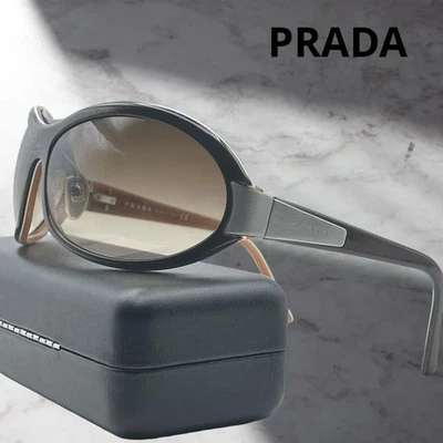 GAFAS DE SOL PRADA USADAS MARCO CELULAR LOGOTIPO LATERAL OVALADO Y2K Foto 1 de 4