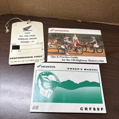 Honda CRF80F 2005 motocicleta manual y etiqueta colgante moto de cross BMX Foto 1 de 4