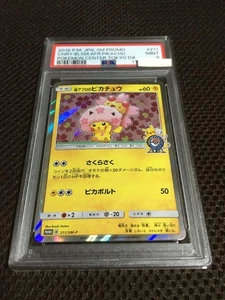 PSA 9 Fiore di Ciliegio Afro Pikachu 211/SM-P 2018 Holo Carta Pokemon Giapponese - Foto 1 di 9