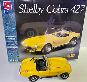 ERTL/AMT SHELBY COBRA 427 1964 KIT MODELLO PRESSOFUSO GIALLO 1/18 COMPLETATO SPEDIZIONE GRATUITA - Foto 1 di 8