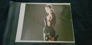 Fotografía firmada por Angelina Jolie autografiada 8x10 Tomb Raider Lara Croft sin certificado de autenticidad - Imagen 1 de 3