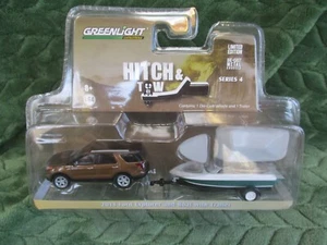 Greenlight Hitch & Tow 2013 Ford Explorer & Boat with Trailer Limited Edition - Picture 1 of 5