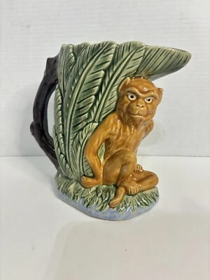 Jarrón/jarra/plantadora de mayólica vintage con mono y hoja de palma Foto 1 de 4