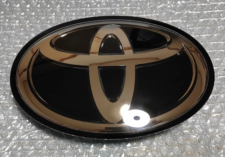 TOYOTA TACOMA 2016-2021 FRONT EMBLEM TSS Badge COVER Grille 90975-02159 OEM - Image 1 of 1