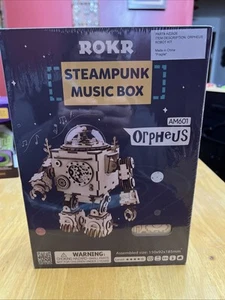 NEW & SEALED￼🔧🤖 Steam Punk Robot ROKR 3D Wooden Music Box Model ORPHEUS ⚙️🎶 - Picture 1 of 6